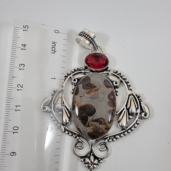 Handmade Silver Pendant with Fossil Coral and Red Garnet Accent - Picture 2 of 10